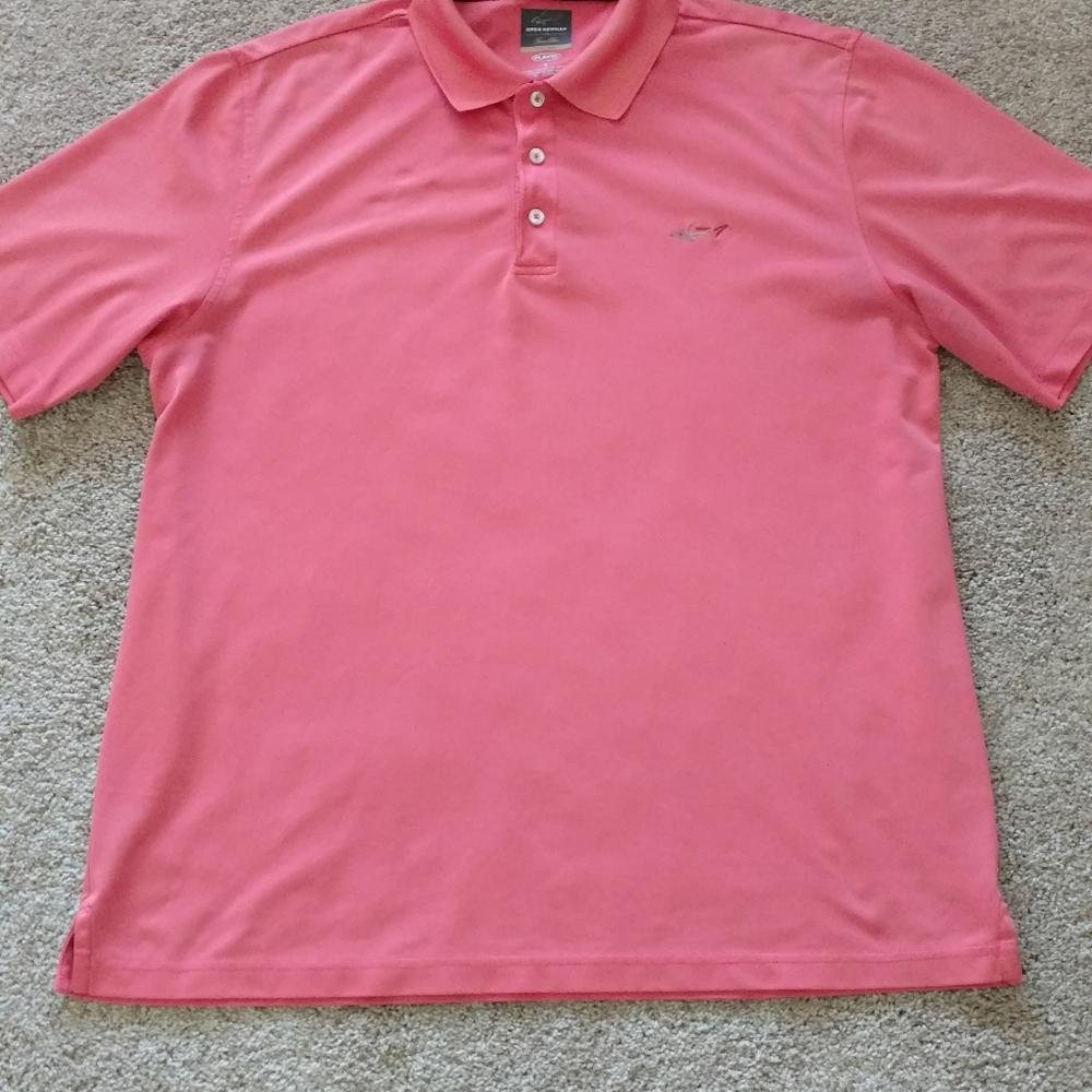 Greg Norman golf shirt size L kind of a peachy or salmon color.